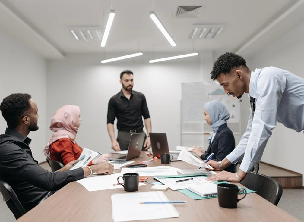 A group of professionals in a meeting room